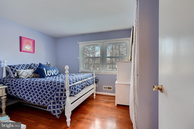 bedroom featuring hardwood / wood-style flooring