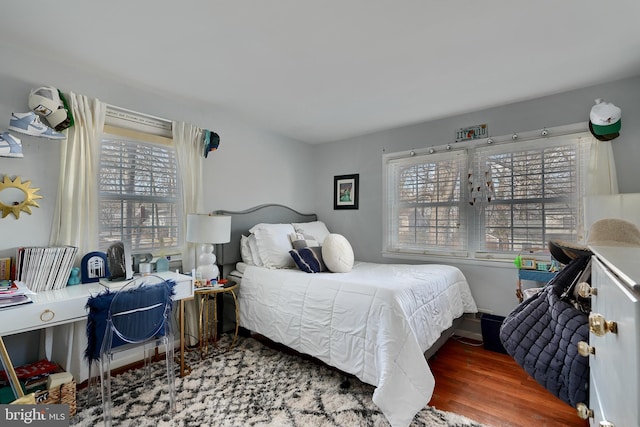 bedroom featuring wood-type flooring