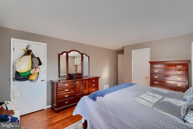 bedroom featuring light wood-type flooring