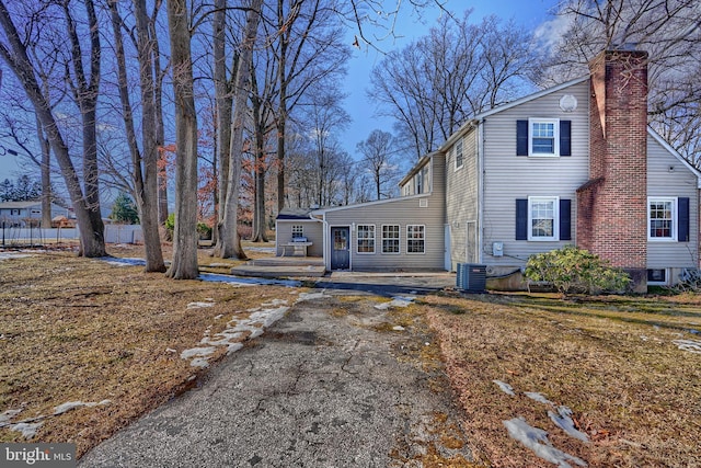 exterior space featuring central AC unit and a patio area