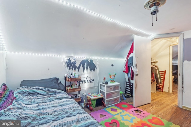 bedroom with wood-type flooring