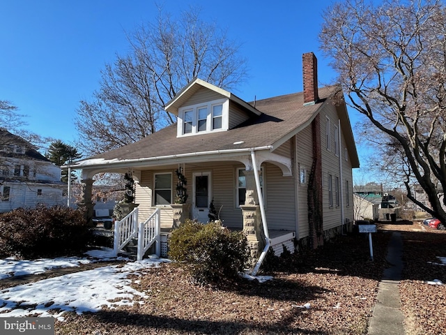 view of front of home featuring covered porch