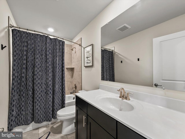 full bathroom featuring shower / bath combination with curtain, vanity, and toilet