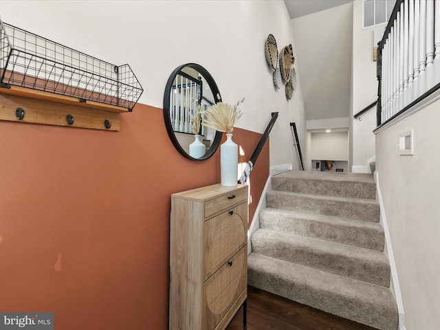 stairway with wood-type flooring