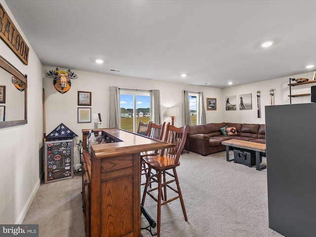 view of carpeted dining area