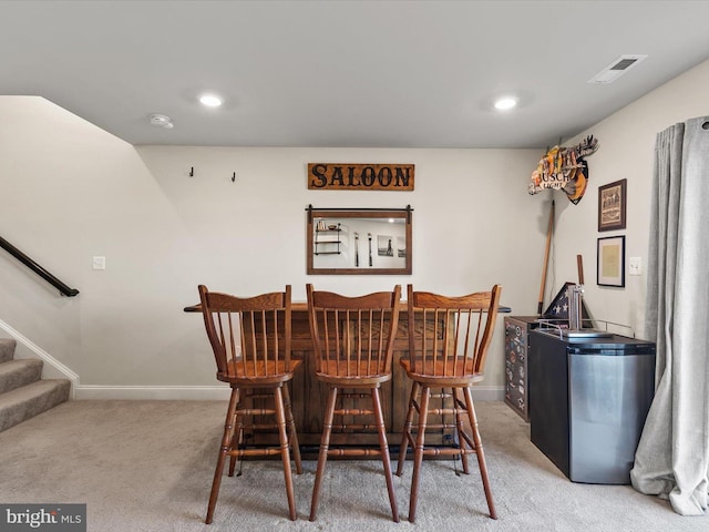 bar with light colored carpet