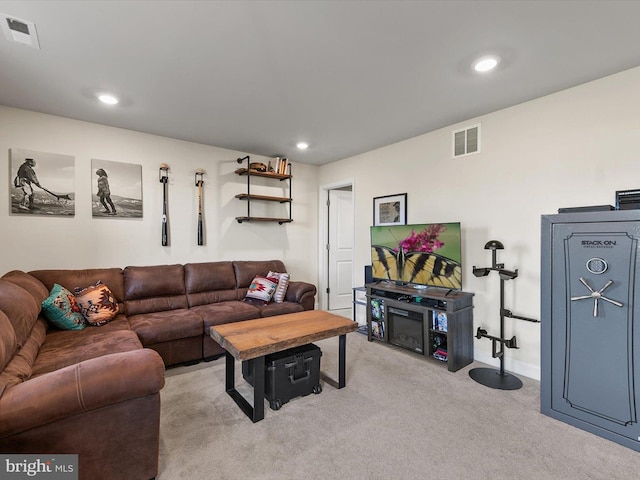 living room featuring light carpet