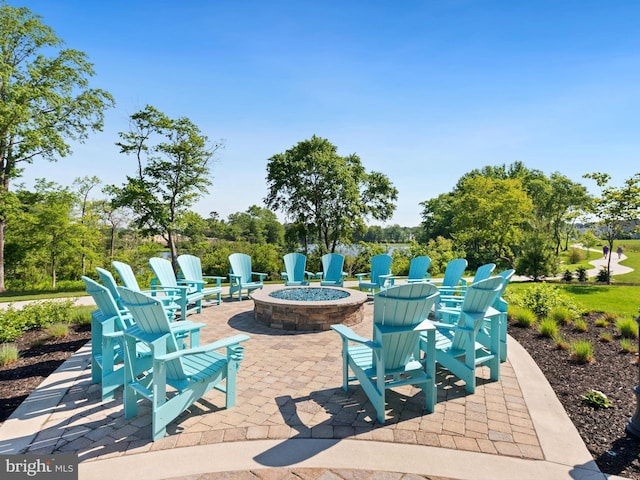 view of patio / terrace with an outdoor fire pit