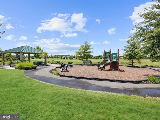 view of play area featuring a gazebo and a lawn