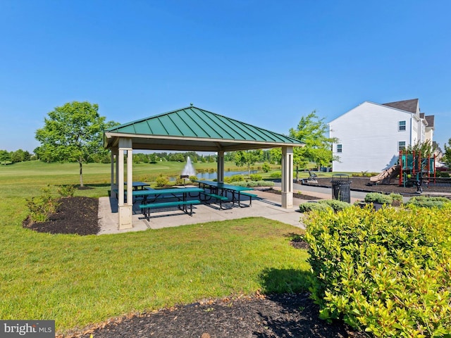 surrounding community with a yard, a gazebo, and a playground