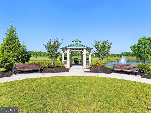 surrounding community featuring a yard, a gazebo, and a water view