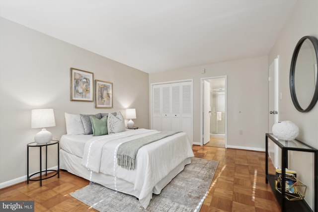 bedroom with parquet floors and a closet