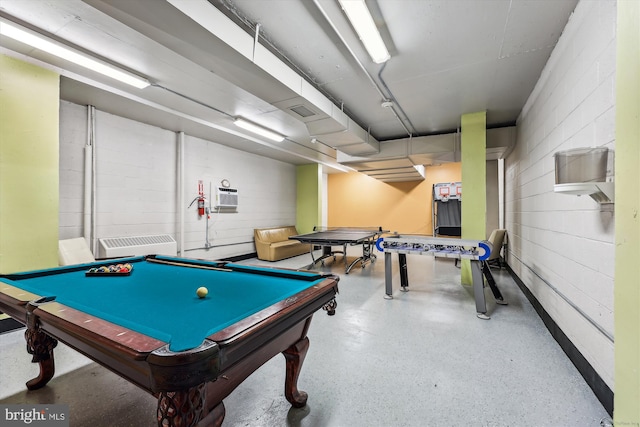 rec room featuring pool table and a wall unit AC