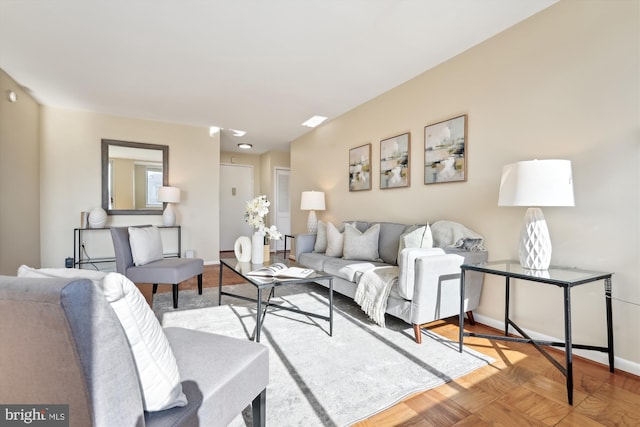 living room featuring light parquet floors