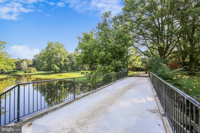 view of patio featuring a water view