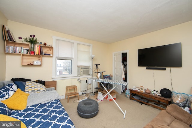 living room with cooling unit and carpet flooring