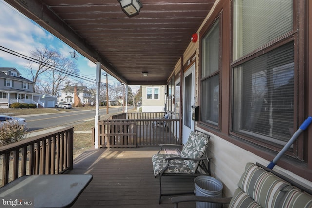 deck featuring covered porch