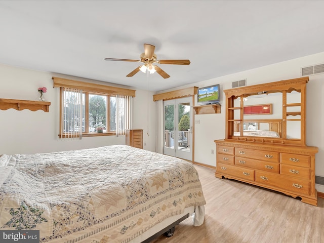 bedroom featuring access to outside, ceiling fan, and light wood-type flooring