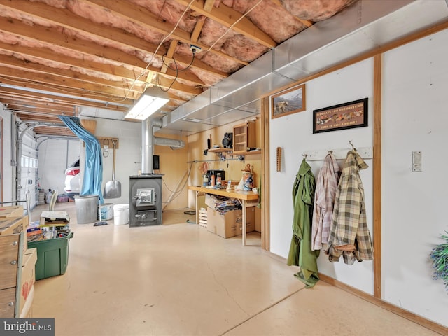 basement featuring a wood stove