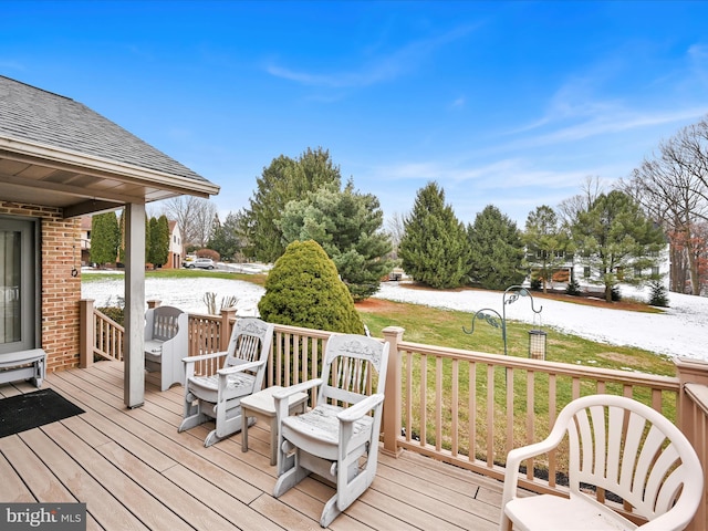 wooden deck with a yard