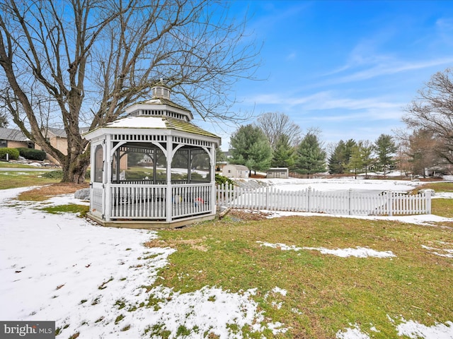 exterior space featuring a gazebo and a lawn