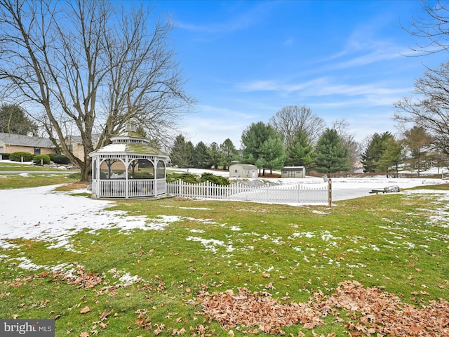 surrounding community featuring a gazebo and a lawn