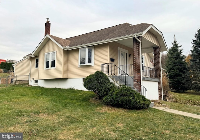 view of home's exterior featuring a yard