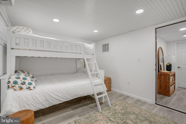 bedroom with light hardwood / wood-style flooring