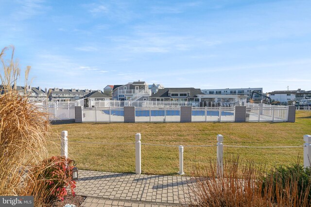 view of yard with a community pool