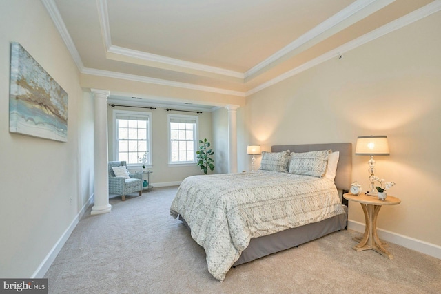 bedroom with decorative columns, carpet floors, and baseboards