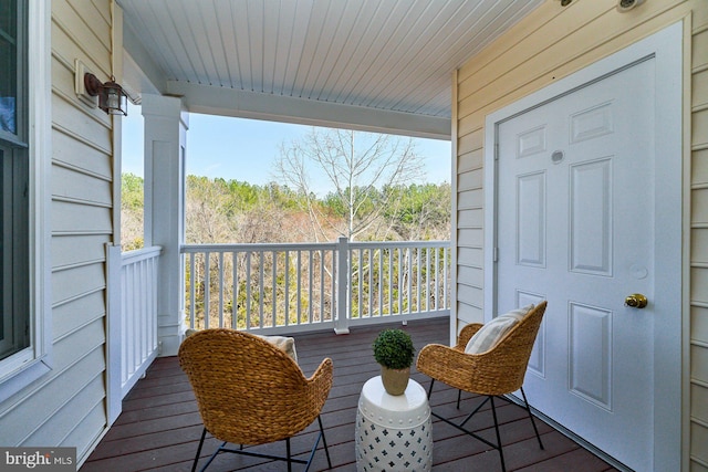 balcony featuring covered porch