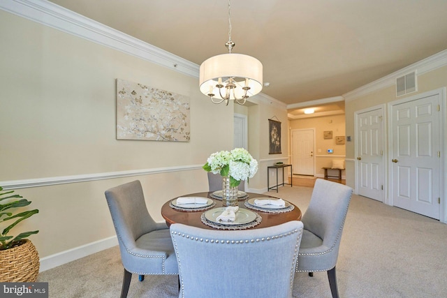 carpeted dining area with crown molding, a notable chandelier, baseboards, and visible vents