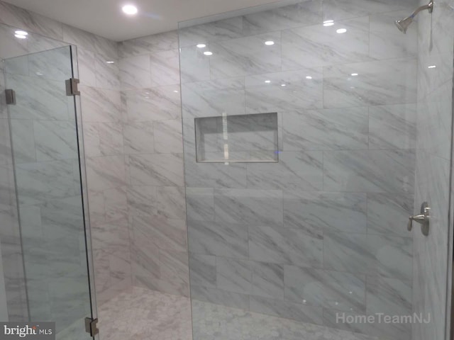 bathroom featuring walk in shower