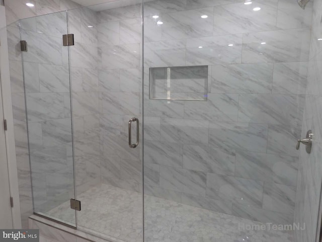 bathroom featuring walk in shower