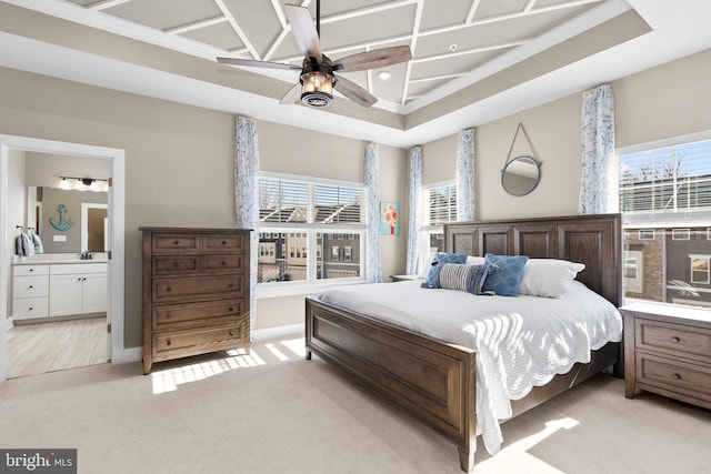 bedroom with connected bathroom, sink, crown molding, light carpet, and ceiling fan