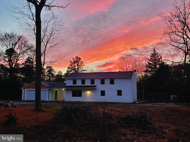 view of front of property with a garage