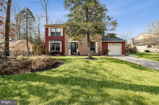 view of front facade with a garage and a front lawn