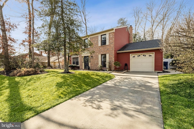 view of front of home with a garage and a front yard