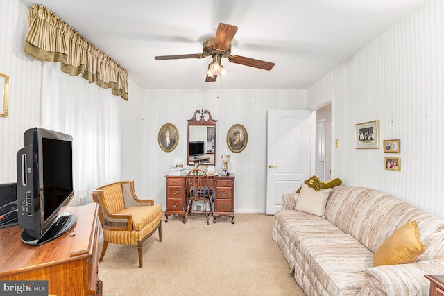 living room with light colored carpet and ceiling fan