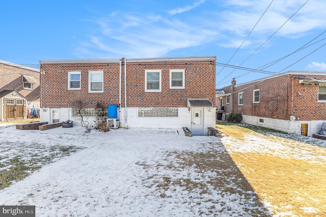 view of snow covered property