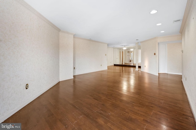 unfurnished living room with dark hardwood / wood-style flooring and ornamental molding