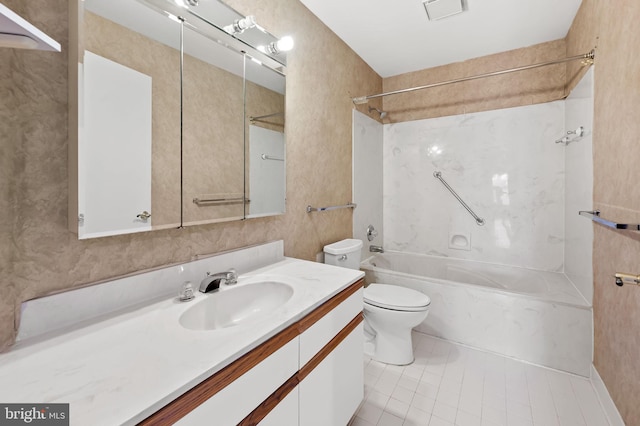 full bathroom with tile patterned flooring, vanity, washtub / shower combination, and toilet