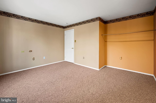 unfurnished bedroom featuring carpet flooring