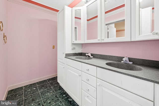 bathroom with vanity and tile patterned flooring