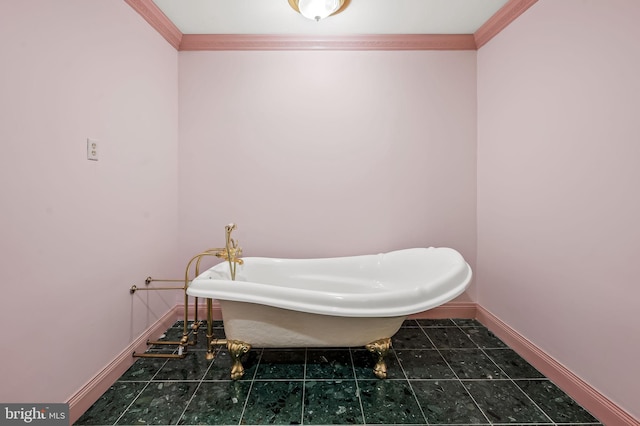 bathroom featuring a tub to relax in, tile patterned floors, and ornamental molding