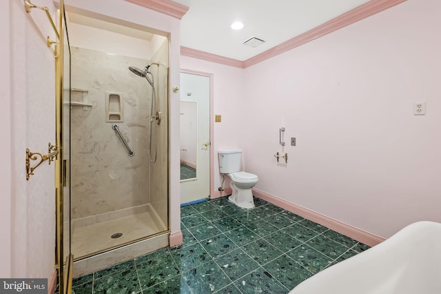 bathroom with a shower with door, ornamental molding, and toilet