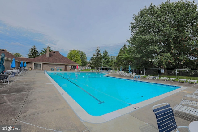 view of pool featuring a patio