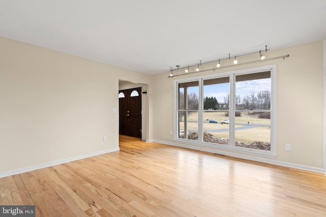 empty room featuring light wood-type flooring