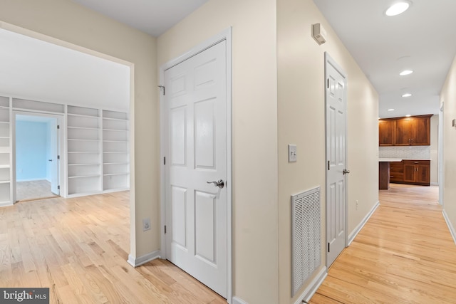 hall featuring light wood-type flooring