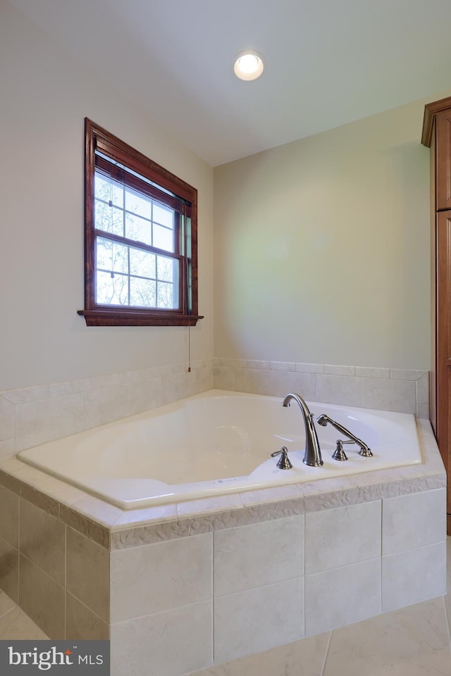 bathroom featuring a bath